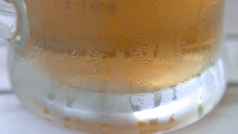 close up cold beer in a terrace, costa brava, spain, static shot