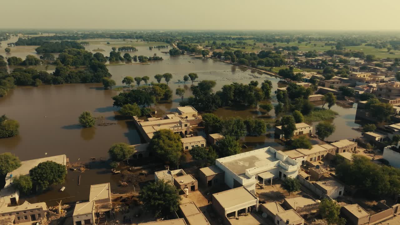 aerial view of floodwater covering houses and trees in jalalpur pirwala punjab pakistan