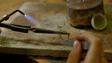 jewelry designer working in workshop 4k