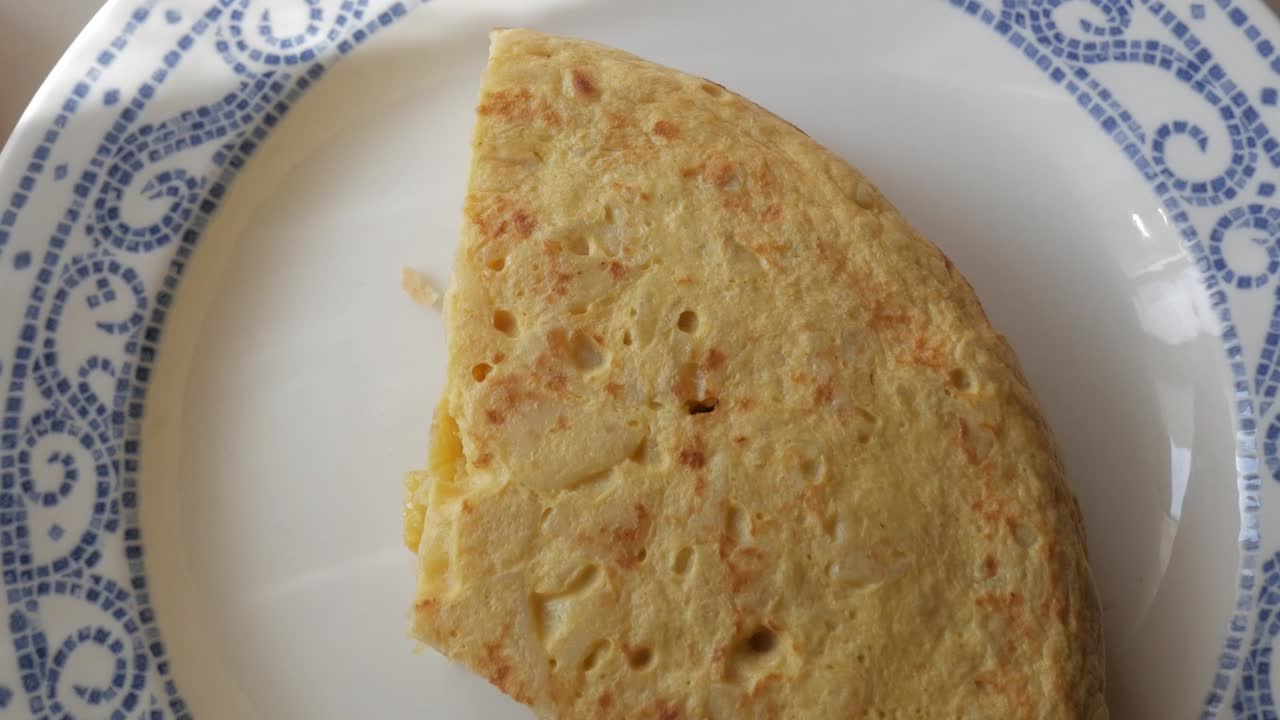 Freshly cooked Spanish potato omelette, crispy on the outside, soft inside