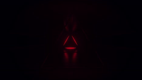 abstract red futuristic background. space from glowing neon light tubes of astera on black background. technology, vj concept. tunnel interior view from a triangle. led lamp. 3d loop animation 4k