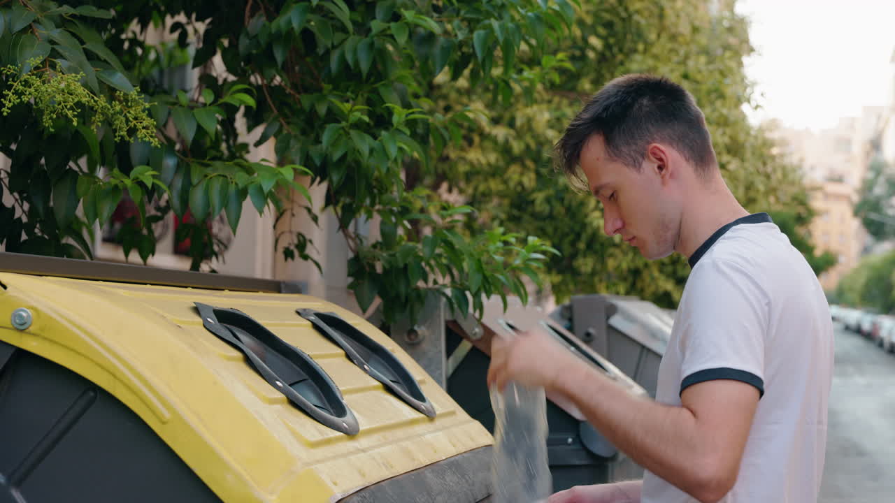Man Recycling Waste on Street
