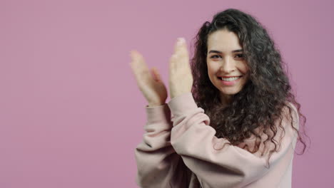 woman clapping with happiness