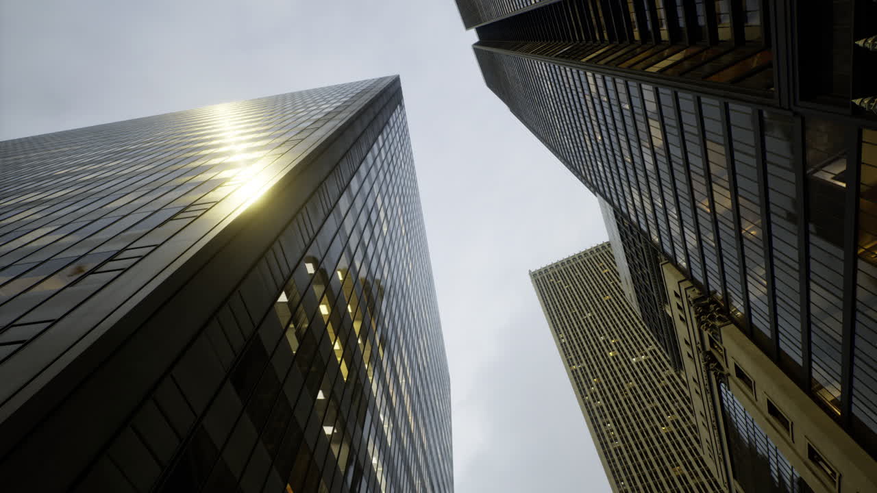 Skyscrapers rise majestically into a cloudy sky over a bustling city landscape
