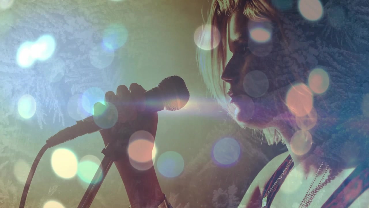 Vertical video: Female singer raising mic and singing for music amid bokeh lens-flare overlays