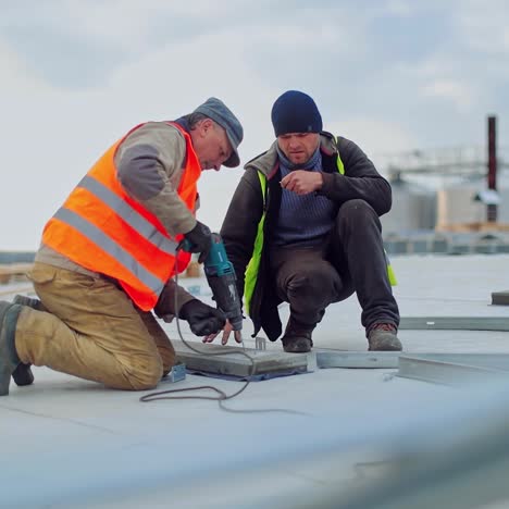 technicians mounting solar panels