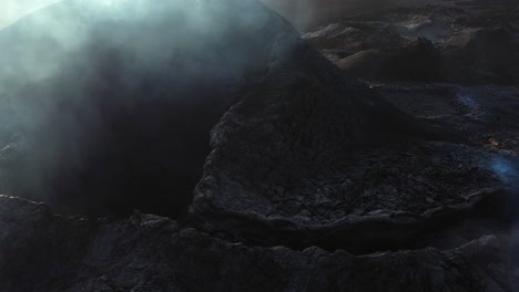 volcanic crater with smoke and steam