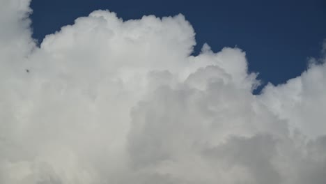 time lapse video of clouds moving against the blue sky