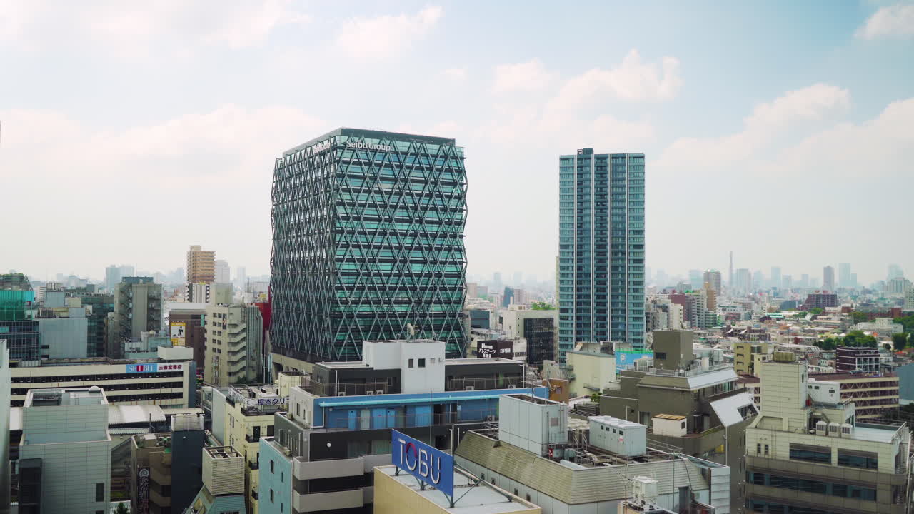 Panoramic view of Tokyo city skyline with mix of buildings from the Ikebukuro district in Toshima city, Japan.