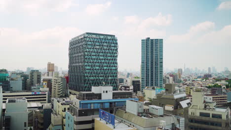 panoramic view of tokyo city skyline with mix of buildings from the ikebukuro district in toshima city, japan.