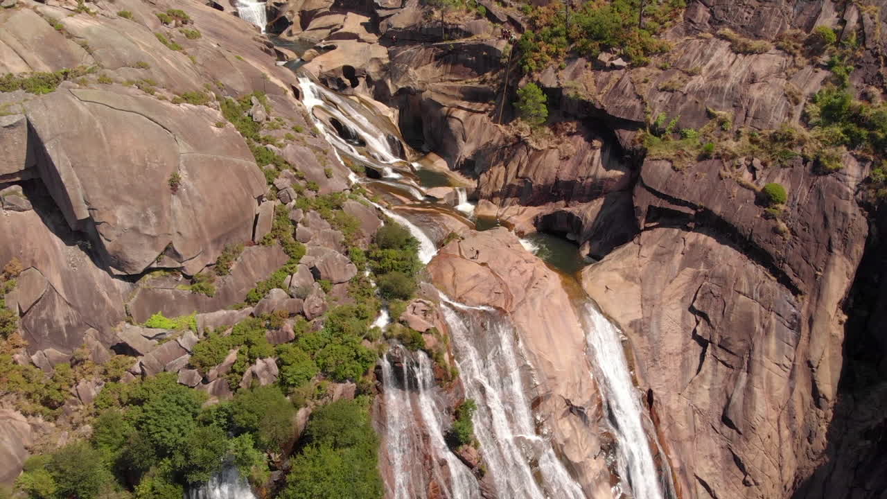 Scenic Aerial View Of The Majestic Ezaro Waterfall (Fervenza Do Ezaro) In Dumbria, La Coruña, Galicia, Spain- drone shot