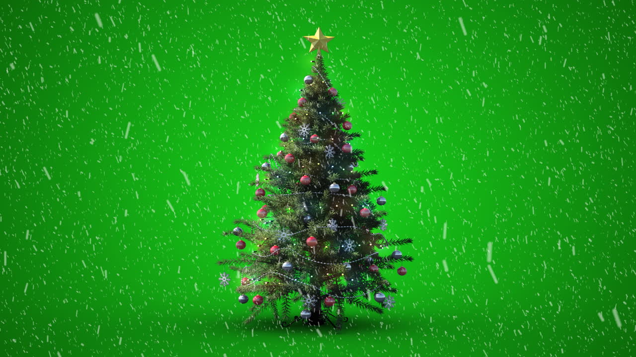 анимация украшенной рождественской елки со снегом, падающим на зеленый цвет