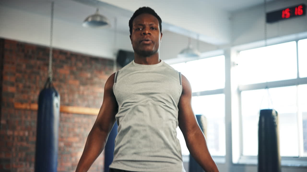 Black man, fitness and skipping rope in cardio