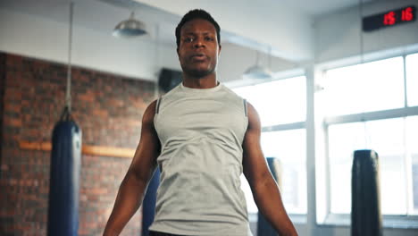 Black-man,-fitness-and-skipping-rope-in-cardio