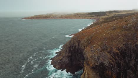 cliffs line the shore in eastern canada near st