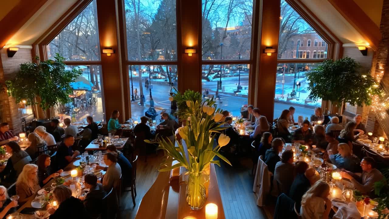 A Bustling Dining Environment Captured in Two Frames: Guests Enjoying Their Meals Amidst Lush Greenery and Warm Lighting, Emphasizing the Cozy Atmosphere of a Vibrant Restaurant Space