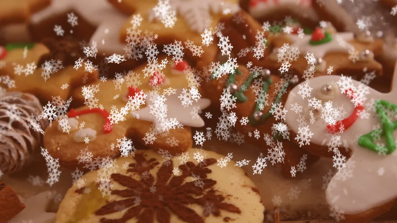 animación de nieve cayendo sobre las galletas de navidad