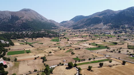 Askifou-plateau,-Chania-agricultural-patchwork-farmland-near-Leuka-Ori-mountain,-Aerial-view,-Crete,-Greece