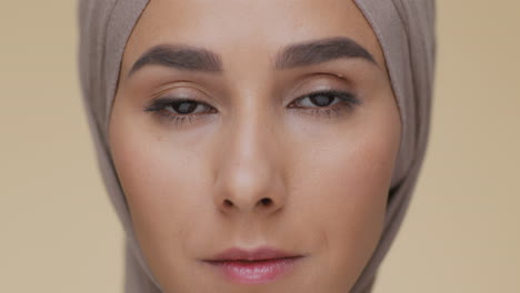 close-up portrait of a woman wearing a hijab