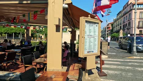 people enjoying meals at a sorrento restaurant