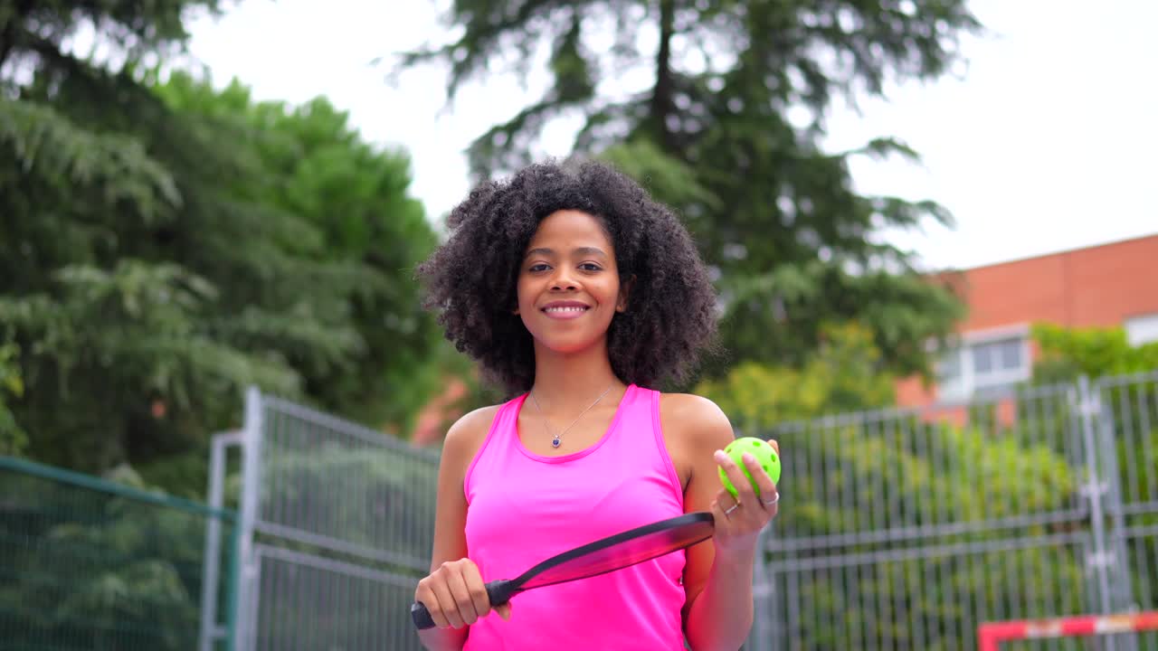 Woman playing pickleball