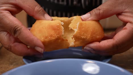 Breaking-bread-to-start-a-meal---bhatura-puffs-served-with-Chana-Masala-series