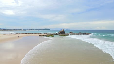 aerial view of currumbin beach during pandemic in currumbin, qld, australia