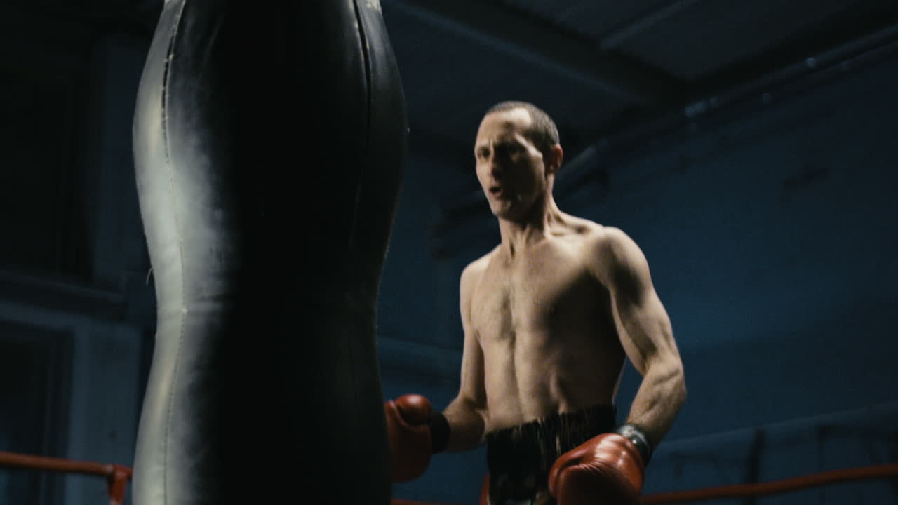 Man Training at the Boxing Gym