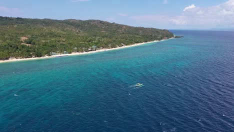 Passenger-boat-at-sun-sea-shore-closeup-aerial-view