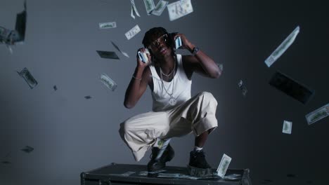 man surrounded by money