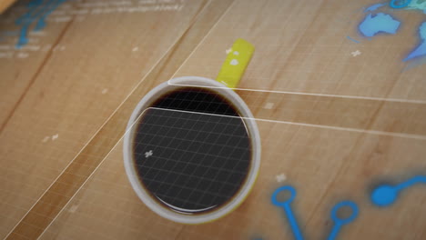 white coffee cup with yellow handle being visualized on wooden tabletop showing ar overlay