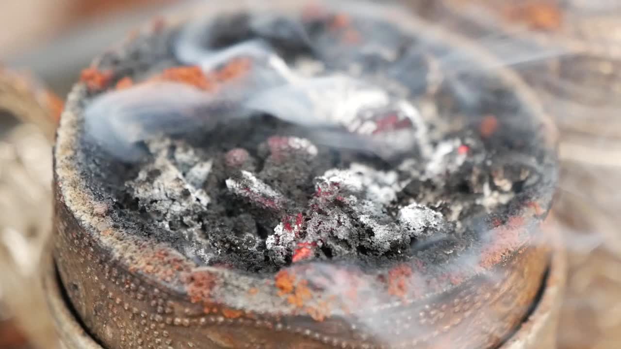 Incense Burning in a Traditional Metal Vessel