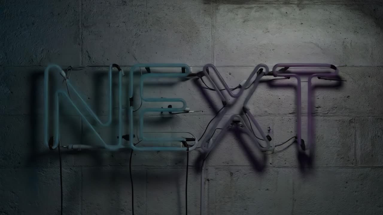 Neon sign 'Next' on a wall