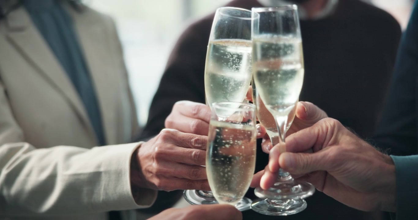Group of Professionals Toasting with Champagne Flutes