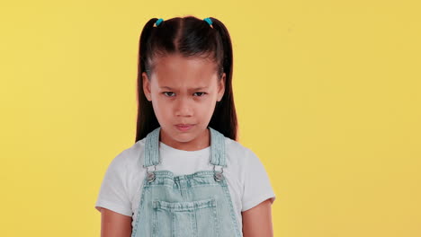 Upset girl with pigtails