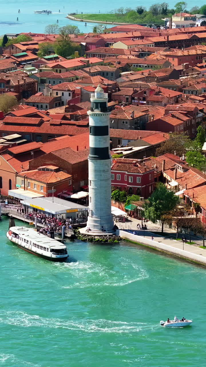 Aerial drone view of the Murano Lighthouse, at daytime Venice, Italy. Vertiical