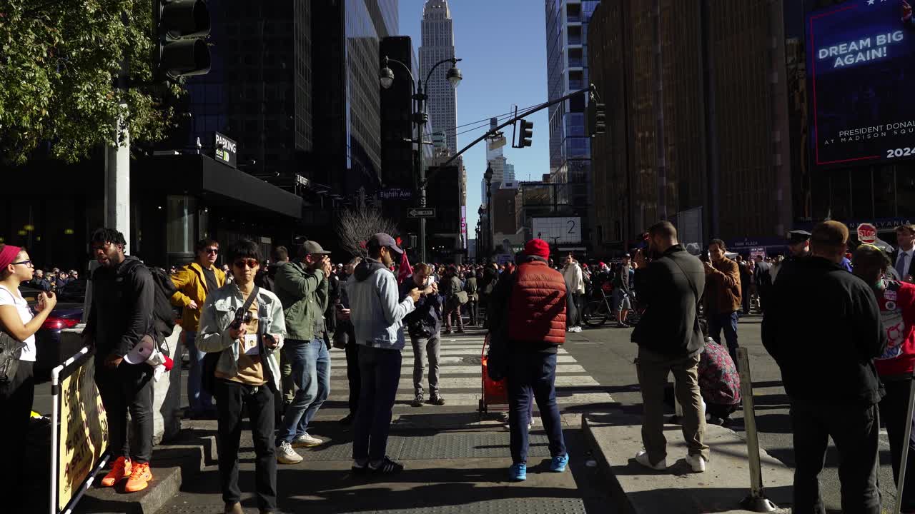 The streets surrounding Madison Square Garden are alive with Trump’s supporters, their voices echoing in the bright sunlight