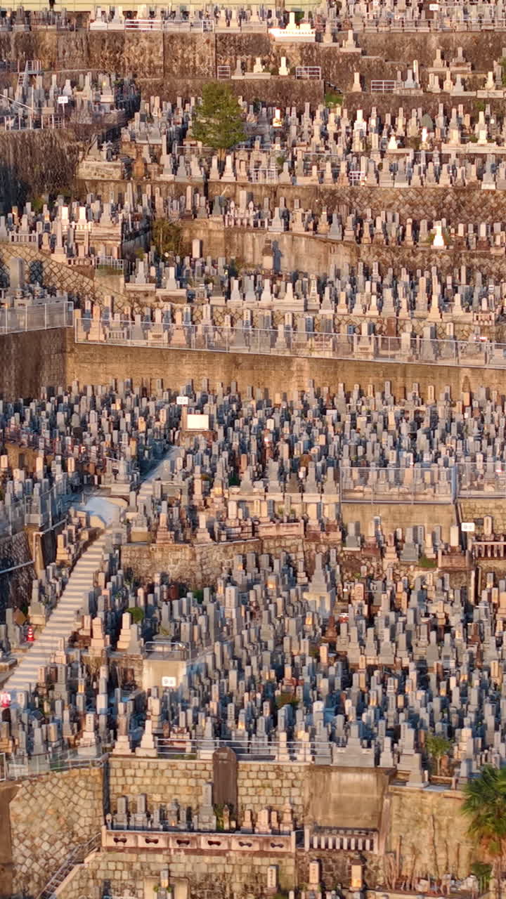 Aerial drone view of the Higashi Otani Cemetery in Kyoto, Japan in daylight