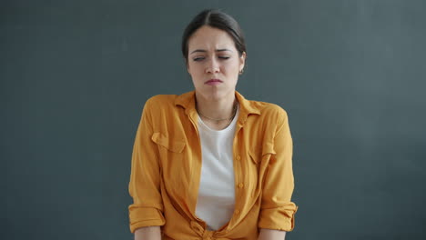 woman with a disappointed expression