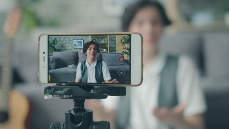 teenager vlogging at home
