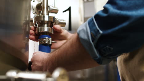 man working at brewery