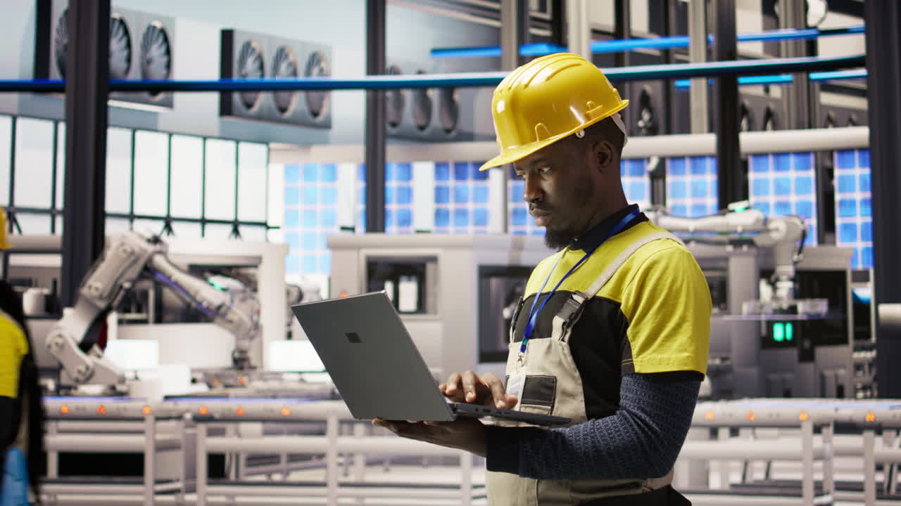 Vertical video Industry 4.0 plant engineer following maintenance procedures to mend bugs