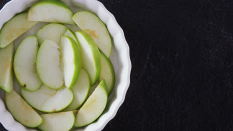 slice of green apple on bowl 4k