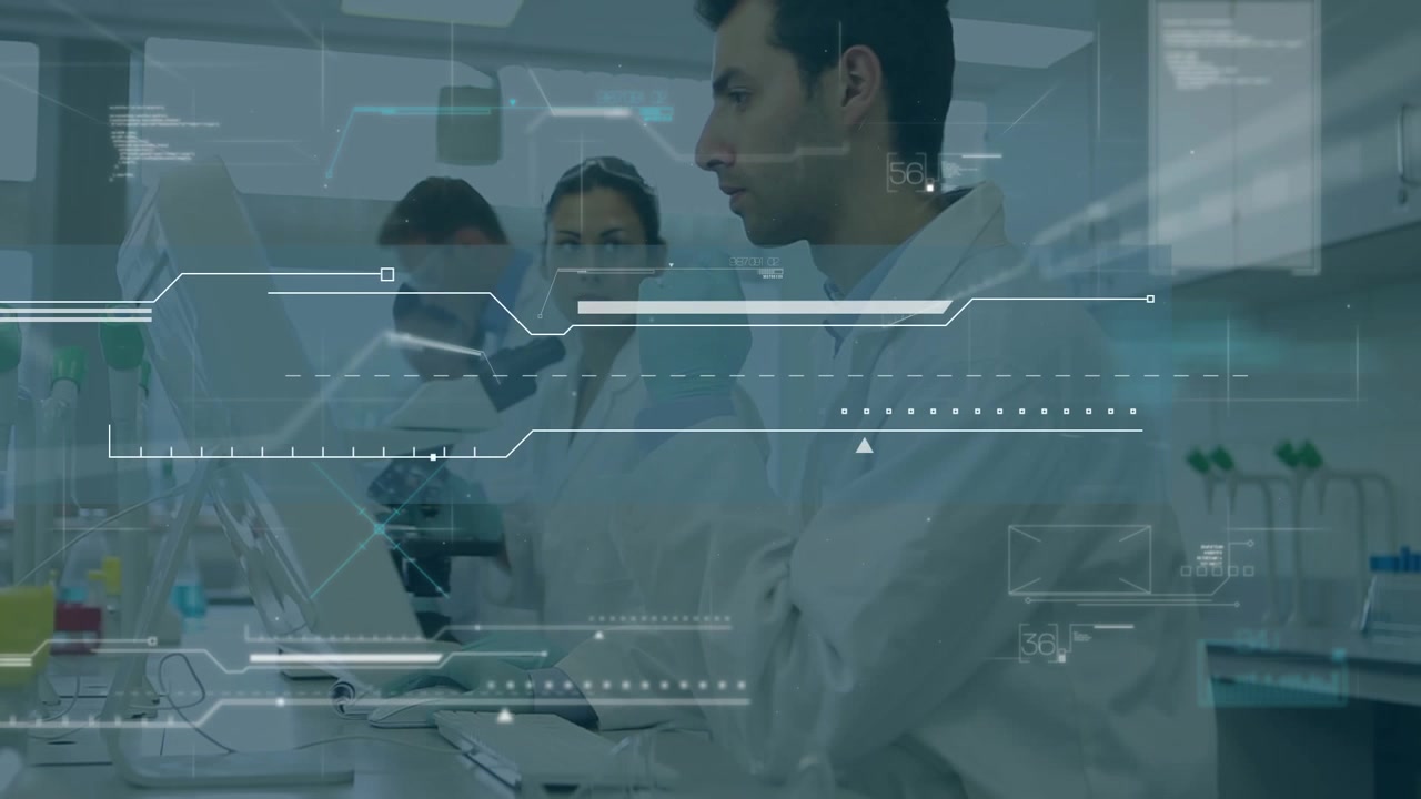 A team of science students working together in a university lab