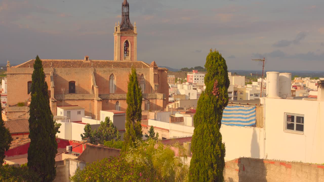 High angle shot over an Old gothic church in Valencian community at Sagunto, Spain on a sunny day