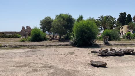 Panning-view-of-Baths-of-Antoninus-or-Baths-of-Carthage,-the-remains-of-an-Archaeological-site-of-Carthage,-Tunisia