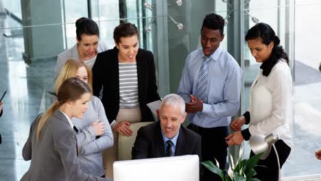 Group-of-business-people-appreciating-their-colleagues-works