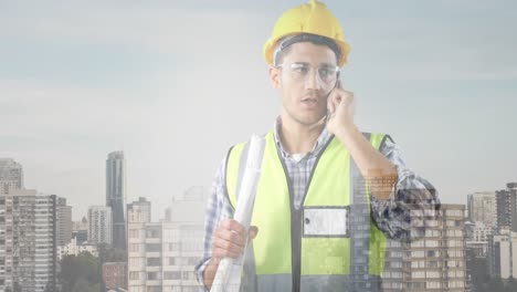 animation of cityscape over caucasian male worker