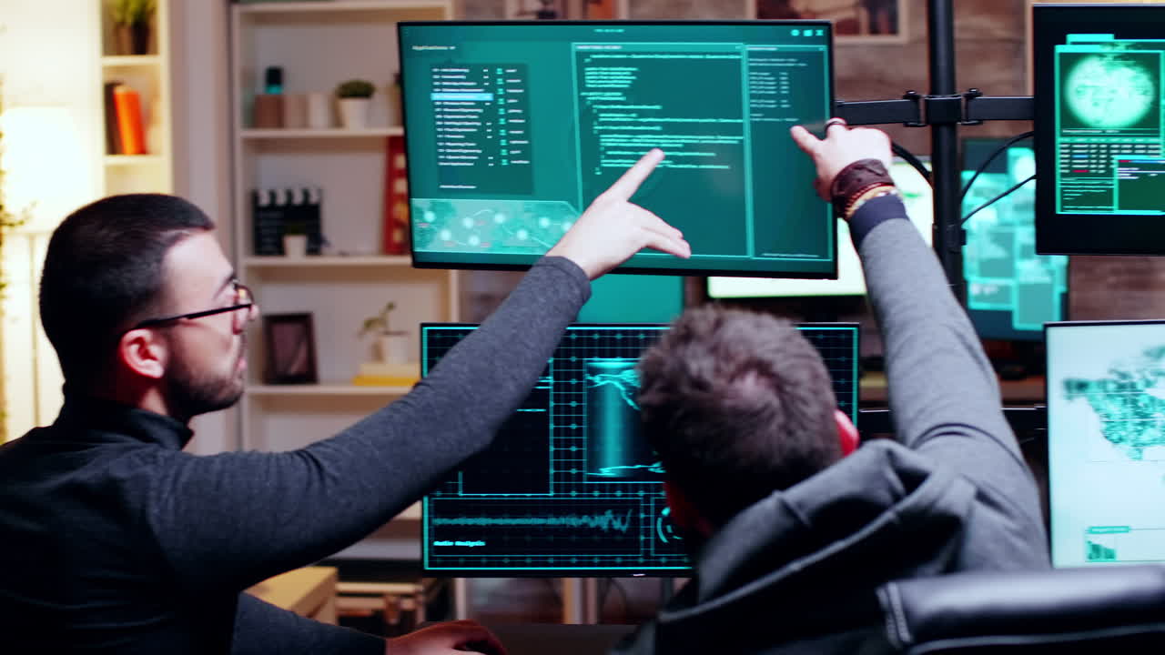 Two male hacker making their attack plan
