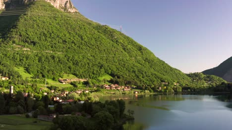 Drone-flying-over-Lake-Endine,-Lombardy,-Italy